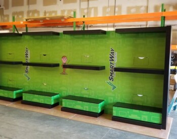 This TV wall for SmartWay is completely unique with a full wrap by IRE, Inc.